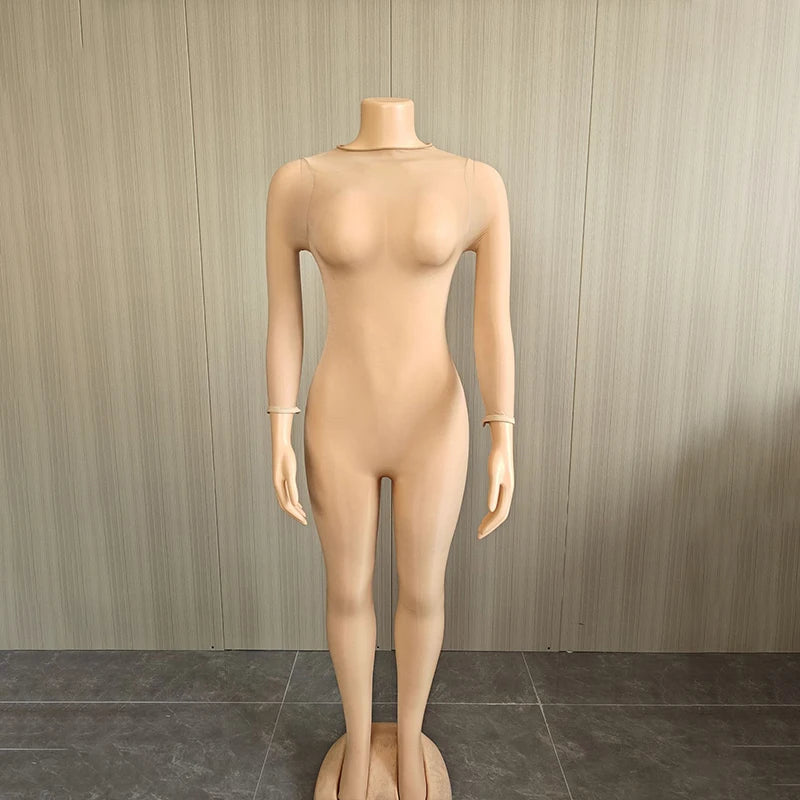 Combinaison en maille transparente à manches longues pour femme