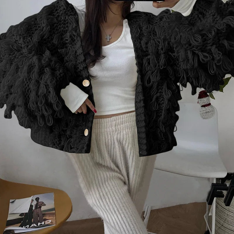 Cardigan femme en maille à boutons et franges