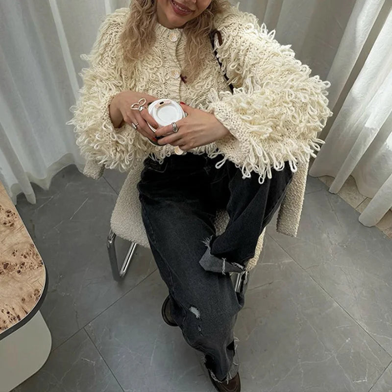 Cardigan femme en maille à boutons et franges