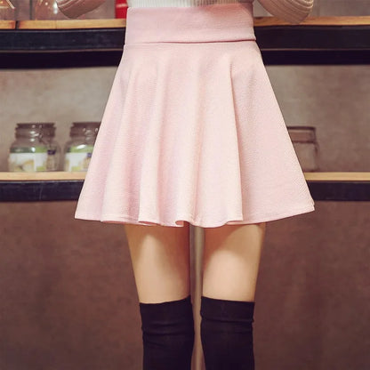 Mini-jupe plissée à taille élastique