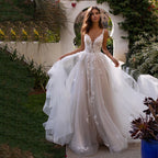 Robe de mariée dos nu et bretelles spaghetti pour femmes