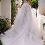 Robe de mariée dos nu et bretelles spaghetti pour femmes
