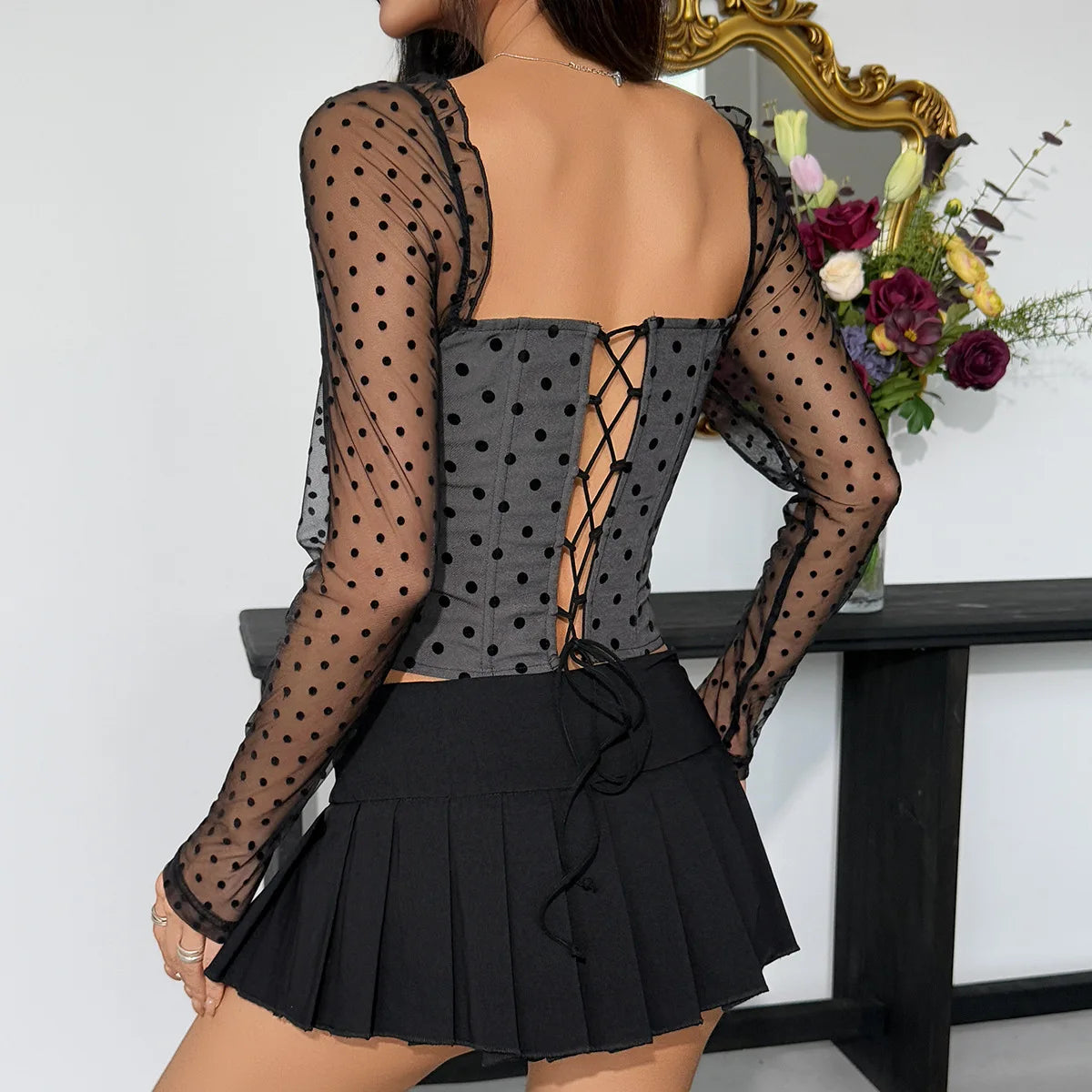 Top à pois avec nœud et empiècements en maille à manches longues pour femmes