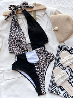 Maillot de bain une pièce blanc et noir, décolleté plongeant en V pour femmes