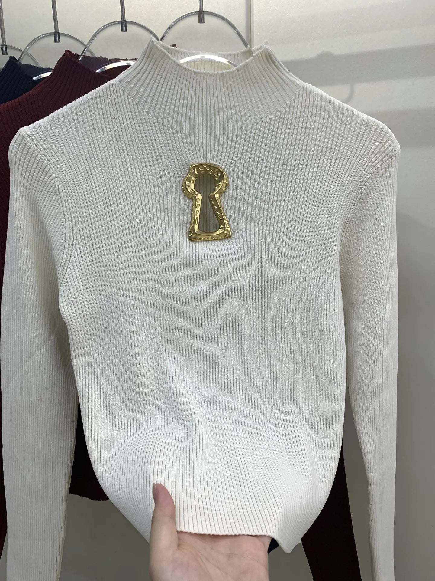 Pull tricoté ajouré à col mi-haut à manches longues pour femmes