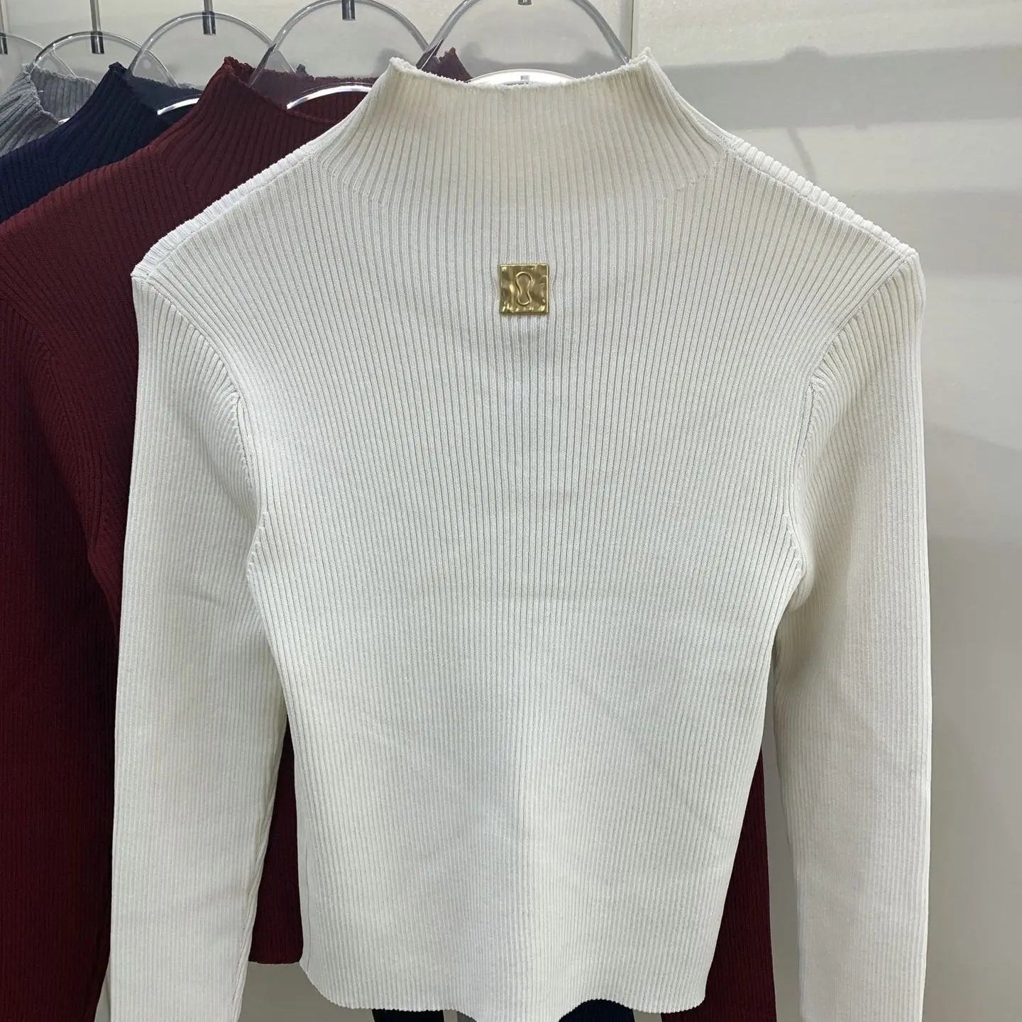 Pull tricoté ajouré à col mi-haut à manches longues pour femmes