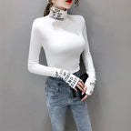 T-shirt à manches longues et col roulé en coton pour femmes
