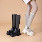Bottes en cuir verni pour femmes
