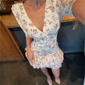 Robe mini à col en V et imprimé floral pour femmes