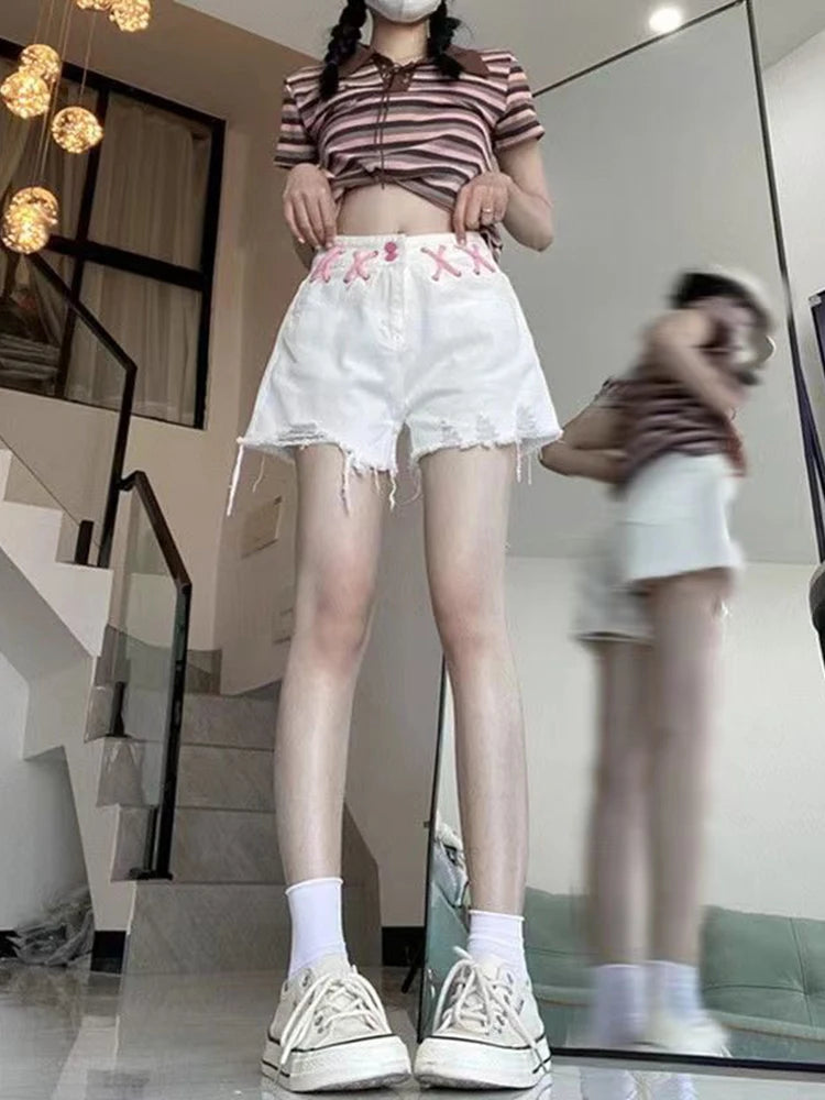 Short en jean blanc déchiré pour femmes
