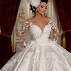 Robe de mariée à manches longues en dentelle brodée pour femmes