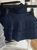 Mini jupes à volants bleu marine pour femmes