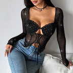 Chemises en maille noire brillante pour femmes