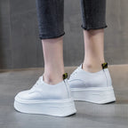Baskets à semelle compensée en cuir véritable pour femmes