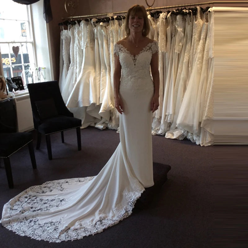 Robe de mariée sirène à manches courtes et dos illusion pour femmes