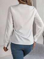 Chemise élégante à manches longues et col en V pour femmes