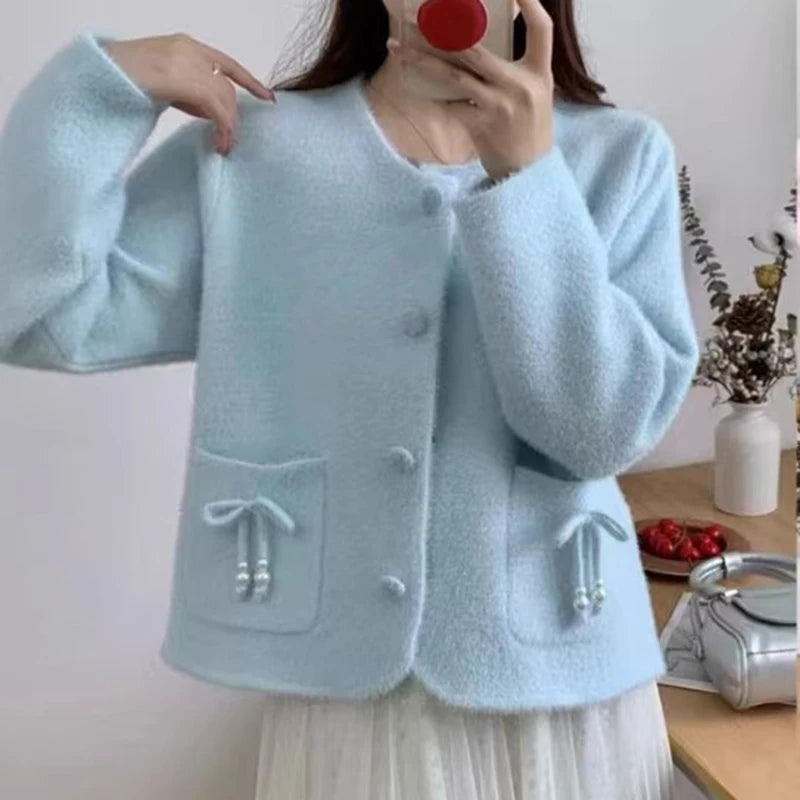 Pull-coat à poches et nœud papillon pour femmes