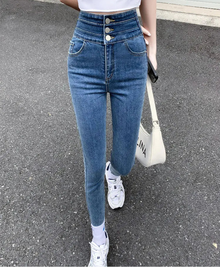 Jean slim taille haute à trois lèvent pour femmes