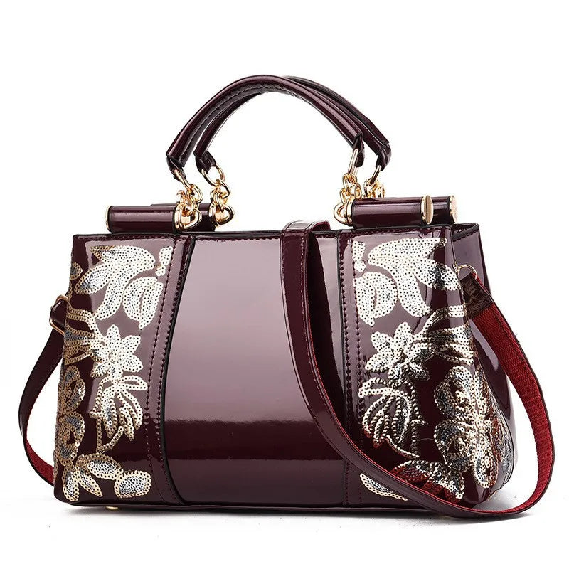 Sac à bandoulière en cuir verni brillant pour femmes