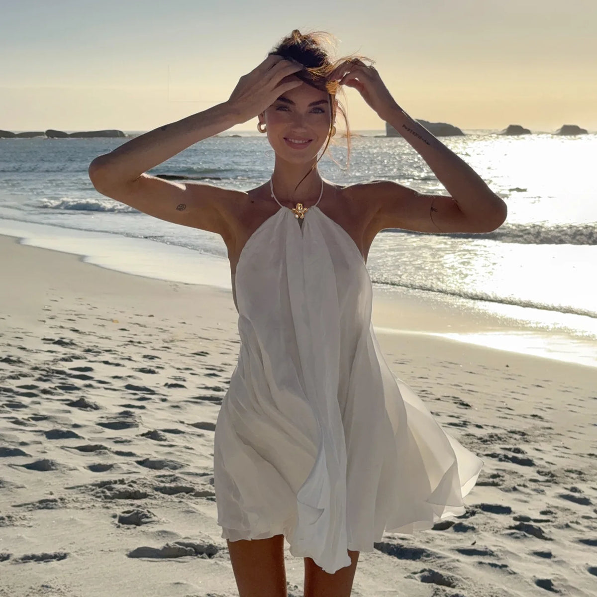 Robe de plage femme blanche dos nu en mousseline