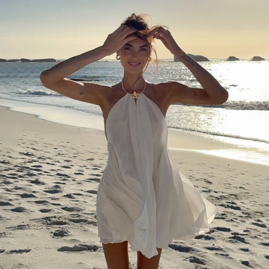 Robe de plage femme blanche dos nu en mousseline