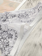 String sexy en dentelle brodée de fleurs pour femmes