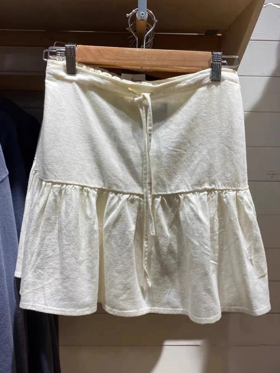 Mini jupe plissée blanche avec cordon de serrage pour femmes