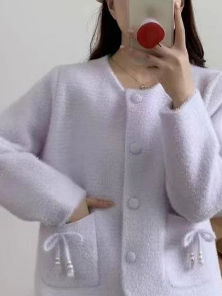 Pull-coat à poches et nœud papillon pour femmes