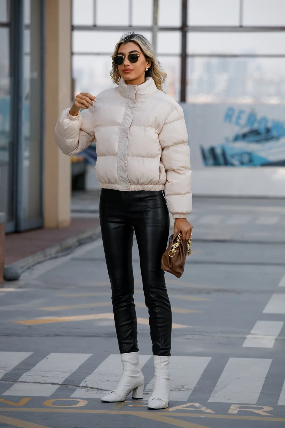 Manteau en coton matelassé à manches longues et col haut pour femmes
