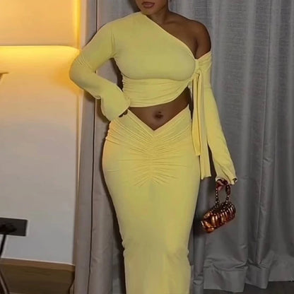 Ensemble femme haut asymétrique et jupe longue froncée