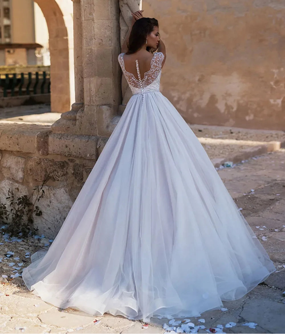 Robe de mariée de bal luxueuse ornée de perles pour femmes