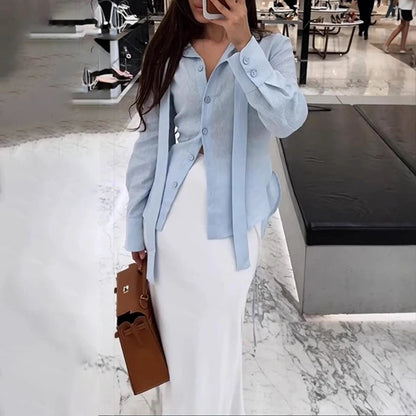 Chemise femme élégante à col noué et manches longues
