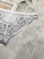 String sexy en dentelle brodée de fleurs pour femmes