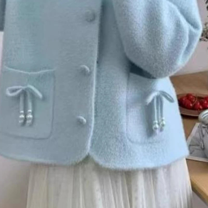 Pull-coat à poches et nœud papillon pour femmes