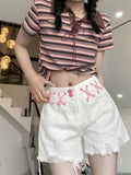 Short en jean blanc déchiré pour femmes