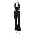 Ensemble composé d'un haut court sans manches à col halter en dentelle florale noire et d'un pantalon long à fermeture éclair pour femmes