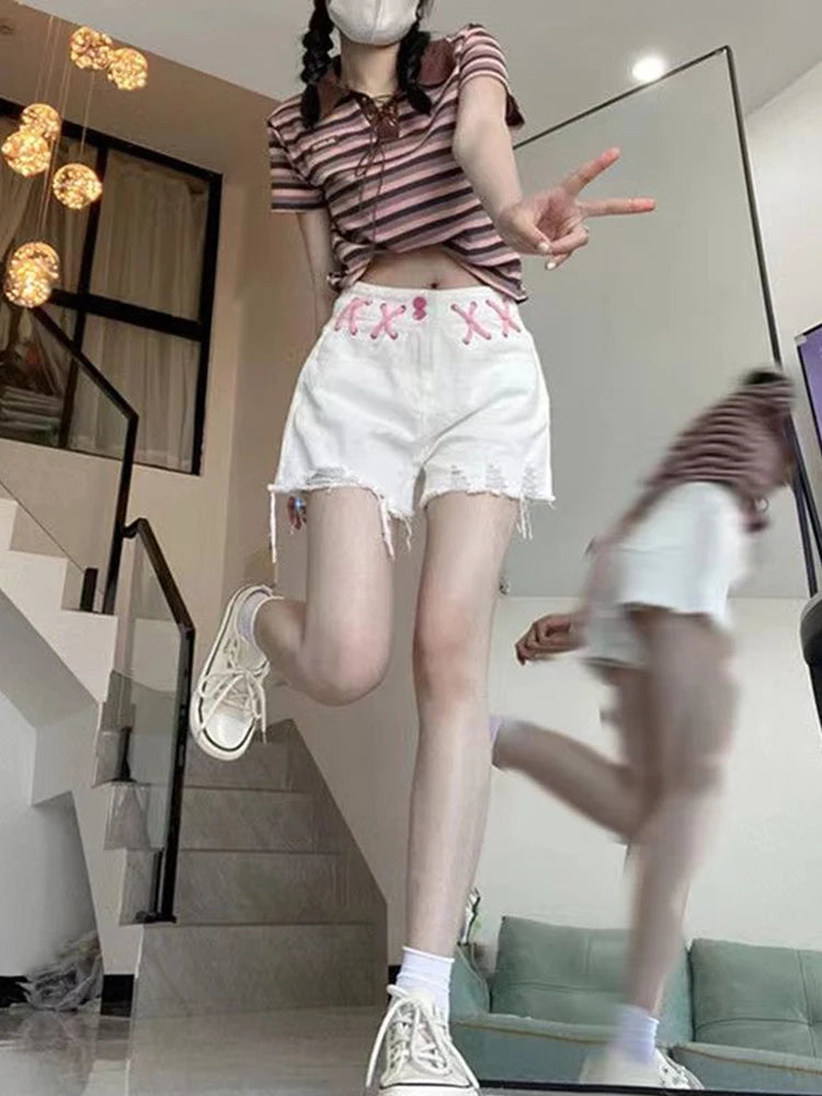 Short en jean blanc déchiré pour femmes