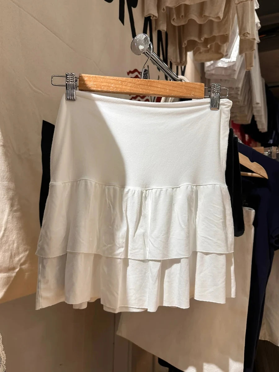 Mini jupes à volants blancs rabattables pour femme