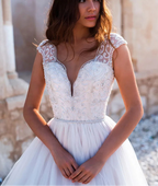 Robe de mariée de bal luxueuse ornée de perles pour femmes