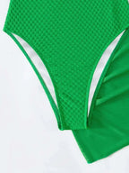 Maillot de bain une pièce torsadé sur le devant, avec nœud sur le côté pour femmes