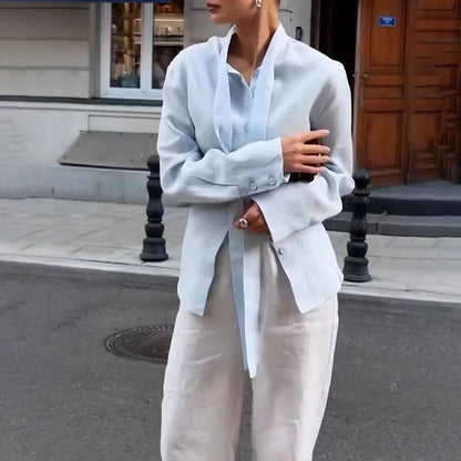 Chemise femme élégante à col noué et manches longues