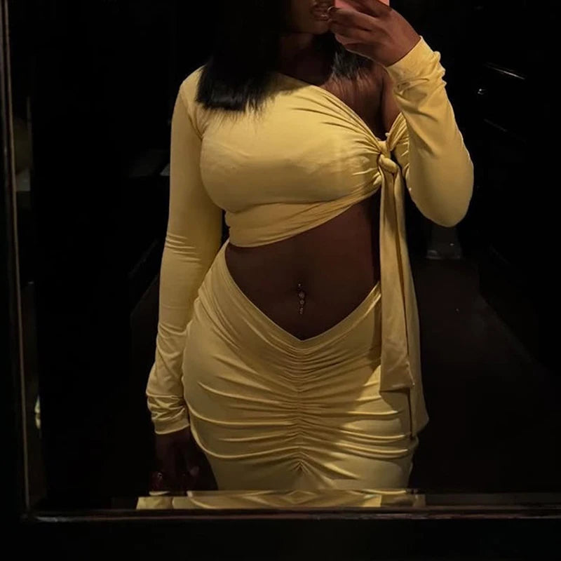 Ensemble femme haut asymétrique et jupe longue froncée