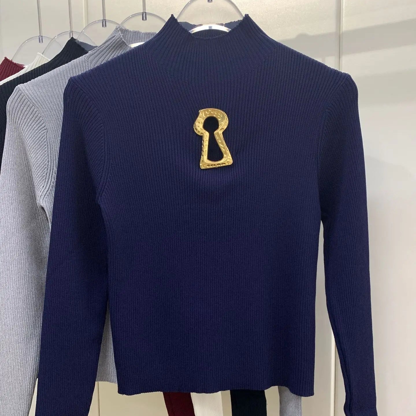 Pull tricoté ajouré à col mi-haut à manches longues pour femmes