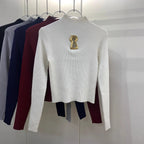 Pull tricoté ajouré à col mi-haut à manches longues pour femmes