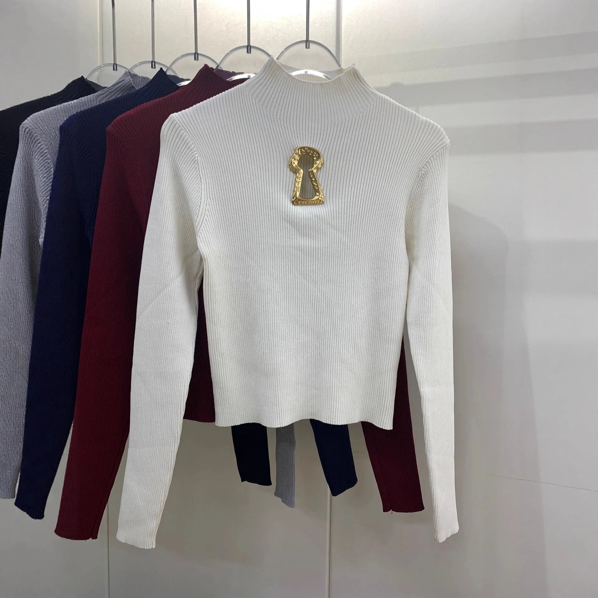 Pull tricoté ajouré à col mi-haut à manches longues pour femmes
