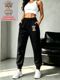 Pantalon de jogging ample en molleton avec emblème indien pour femmes