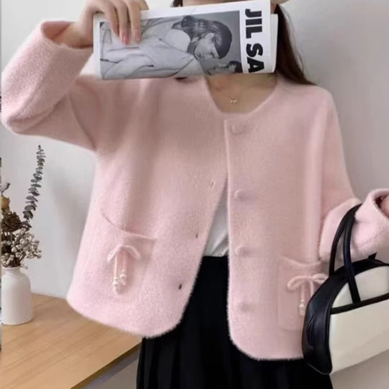 Pull-coat à poches et nœud papillon pour femmes