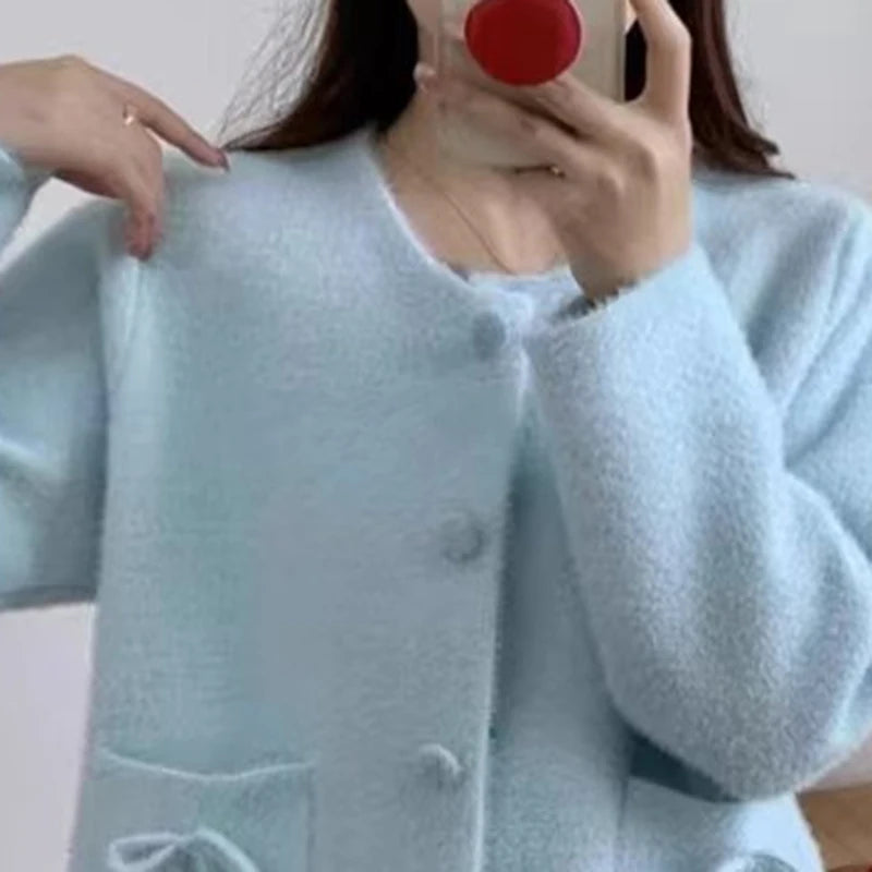 Pull-coat à poches et nœud papillon pour femmes