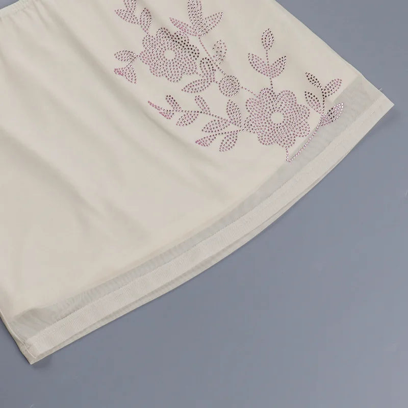 Ensemble deux pièces sexy jupe mini et haut sans manches à bretelles pour femmes